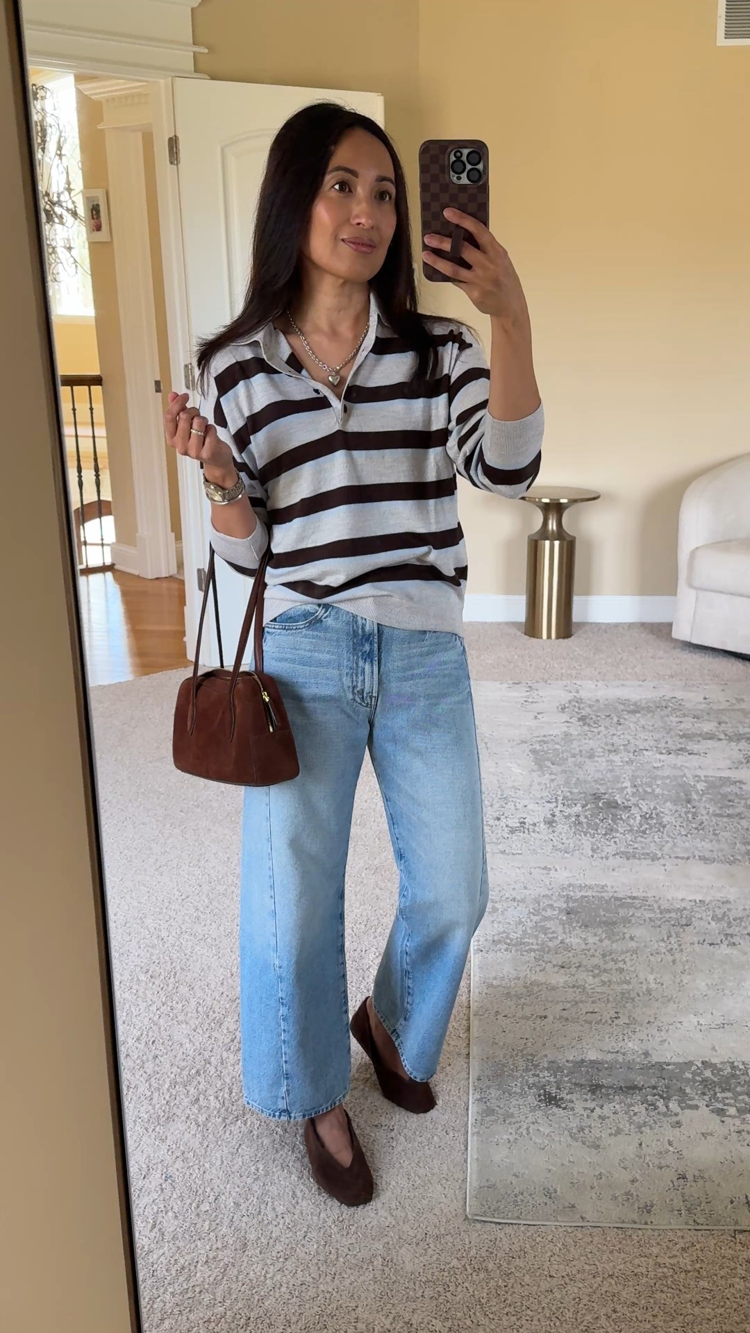 Fall outfit. Rugby shirt. Merino sweater. Restocked in all sizes  
This rugby style sweater gives nice lightweight warmth. I love this blue and brown striped option; also available in another color. I sized up but could also wear true to size. 
Barrel jeans. I sized up. 
Suede handbag. Suede bag. 
Suede flats. Brown flats. 
Heart necklace. 
Bangle bracelets that are lightweight and water durable. 


#LTKOver40 #LTKootd #LTKStyleTip