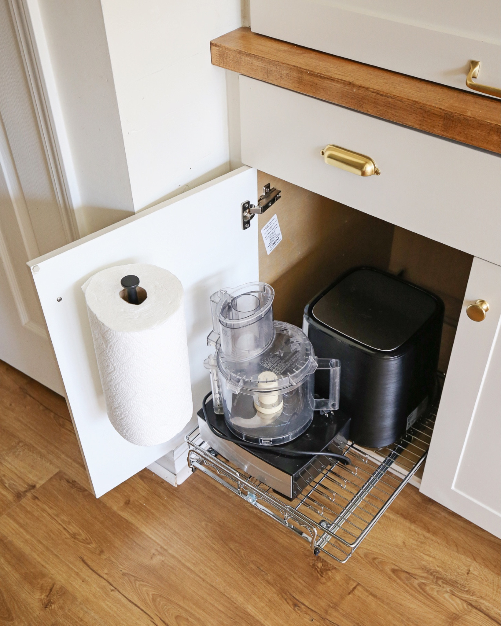 Kitchen cabinet organization from @Wayfair. Including sliding pullout cabinet drawer, wall mounted paper towel holder, bakeware divider cabinet organizer, and a recycling bag cabinet door organizer @wayfair #WayfairPartner #Wayfair #kitchenorganization #kitchenstorage #organizationideas

#LTKFindsUnder100 #LTKFindsUnder50 #LTKHome
