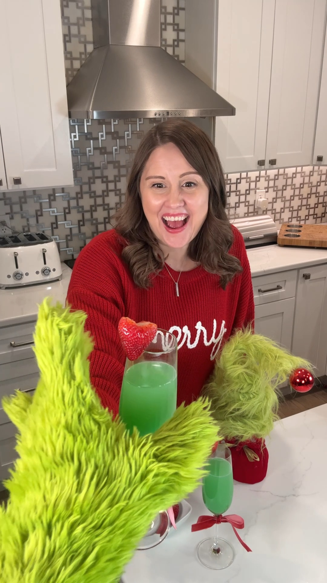 Grinch Mimosas that are as festive as they are fun! 💚🍹 Start with a splash of blue curaçao in your champagne flute, then perch a small ornament glass filled with orange juice on top. When it’s time to serve, pour the OJ in, creating that perfect Grinchy green hue. Top with bubbly or sparkling cider for a kid-friendly twist and garnish with a heart-shaped strawberry. 🍓✨ A holiday drink that’s sure to steal the show! #GrinchMimosas #HolidayDrinks #FestiveFun #Grinch HolidayDrinks #TheGrinch #HolidayParty 

#LTKHoliday #LTKSeasonal #LTKParties