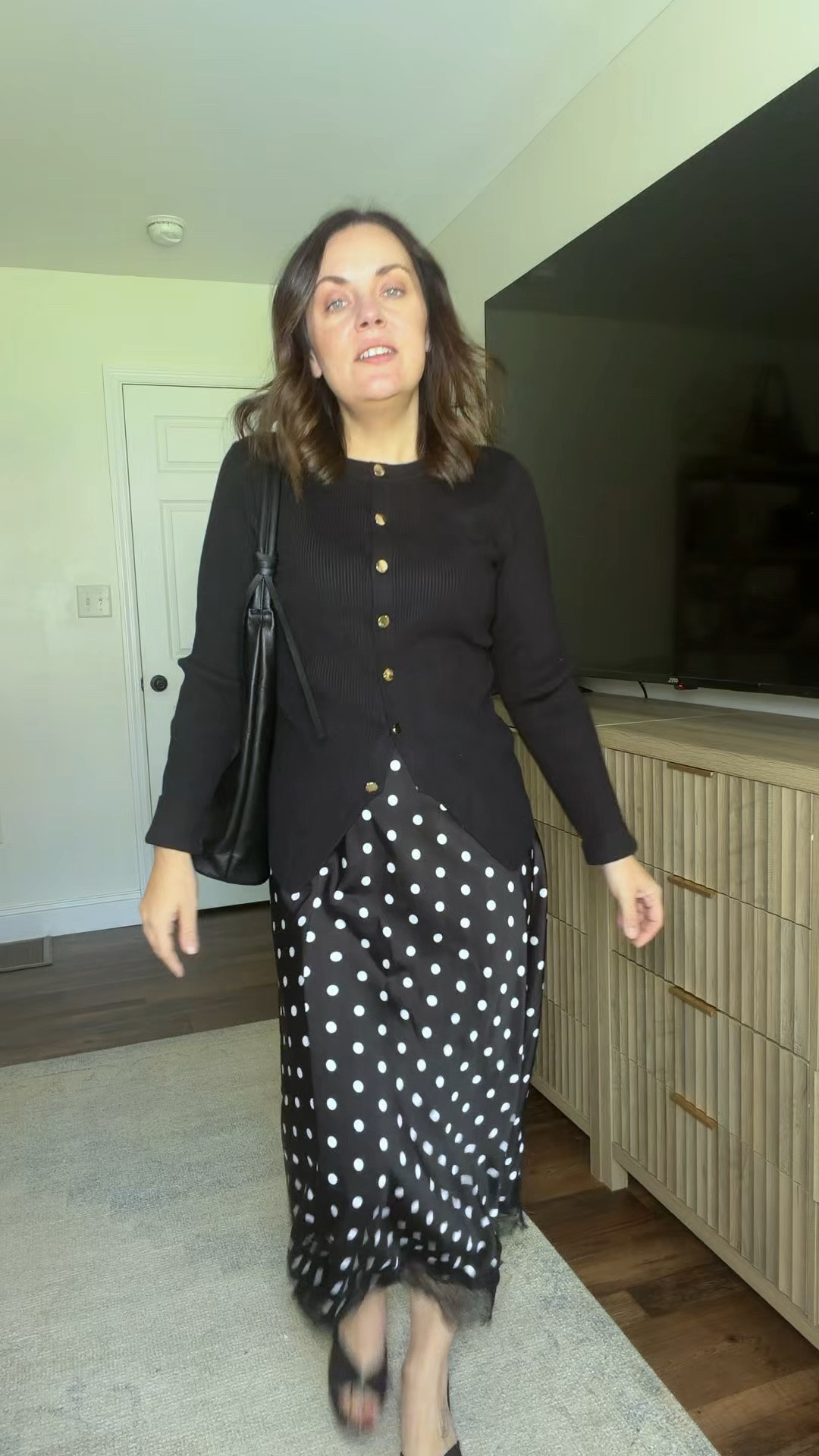 Amazon fall outfit 🖤🍂 This polka dot skirt is such a cute way to switch things up from jeans this fall! I love it paired with a simple black cardigan for an easy, feminine look that works for date night, church, work, or dinner. Linking the full Amazon look!

#LTKootd #LTKSaleAlert #LTKSeasonal