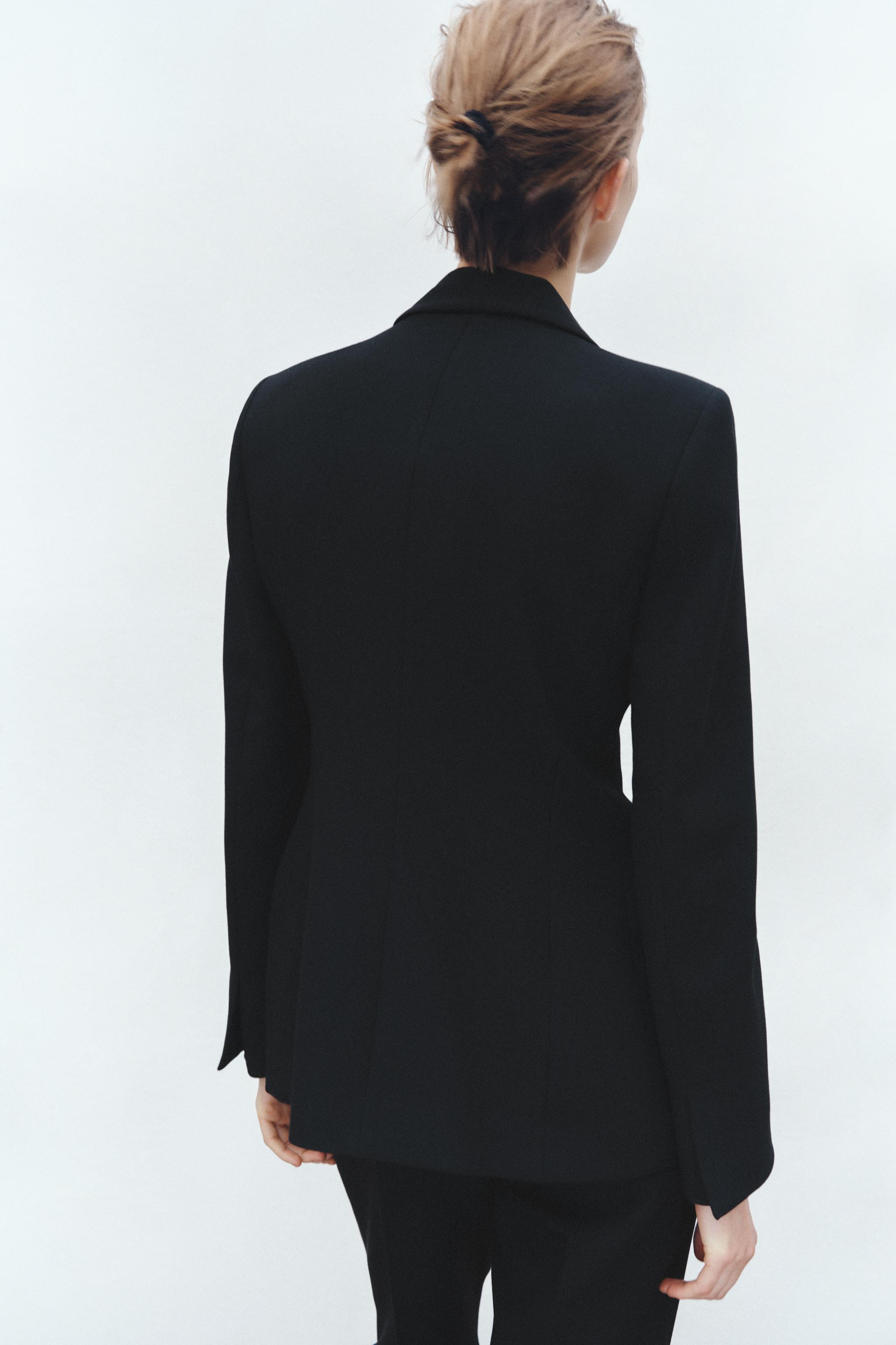 Blazer with lapel collar and long sleeves with shoulder pads. Front flap pockets. Single button f... | Zara US