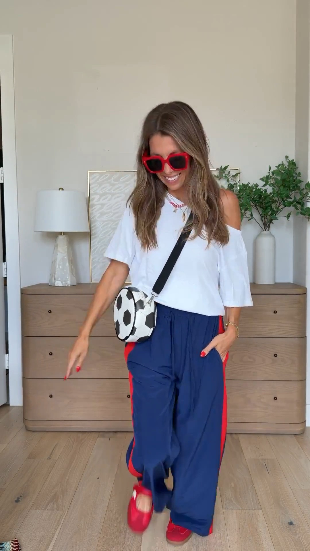 Love these Amazon track pants!! Size XS - lots of color and print options and only $29.99!!! Off the shoulder white tee is a great staple! Mary Jane sneaker look for less! Soccer ball purse old navy

#LTKgrwm #LTKdayinmylife #LTKootd