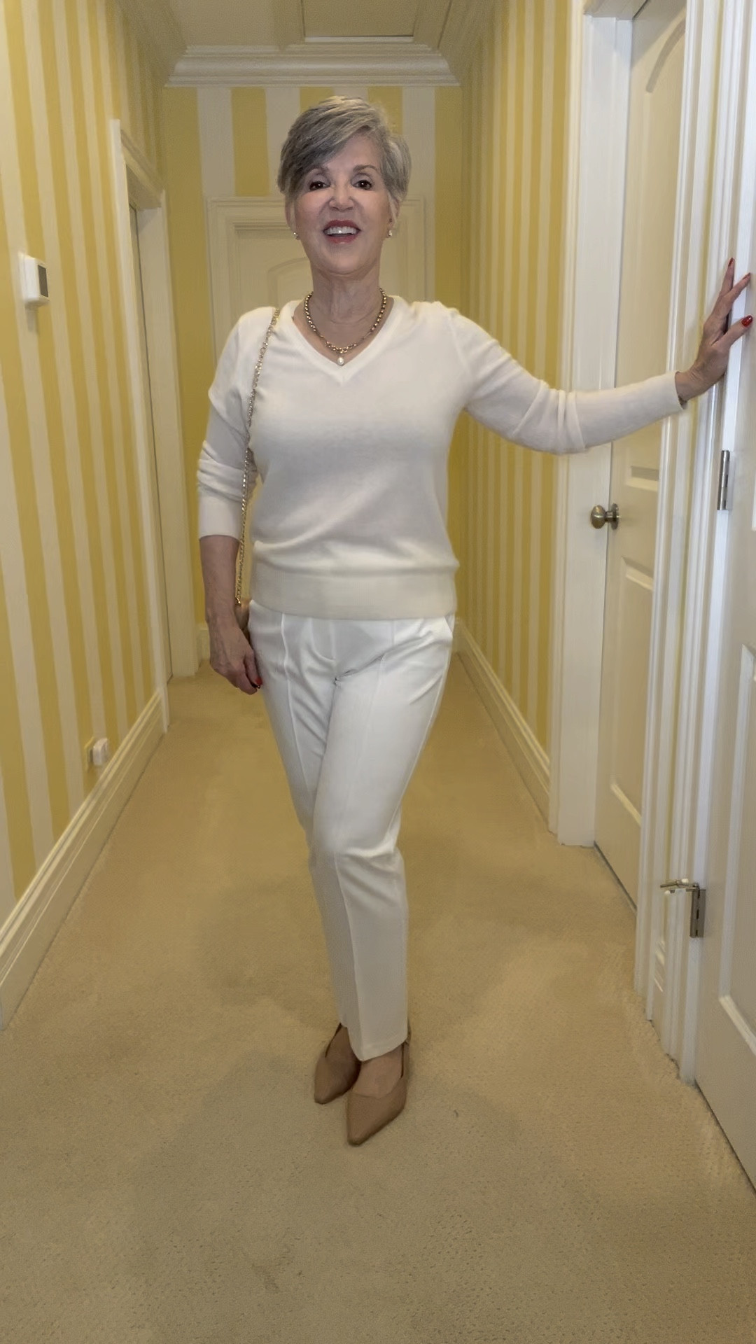 If you want to look thinner and taller this look is for you! It’s called columnar dressing. You match your top to your bottom which creates a long visual line that is slimming and it can also make you look taller (especially if you add similar nude @naturalizer pumps). This @quince cashmere v-neck is $50 and it comes in 19 colors! It looks so pretty with winter white @talbots pants as well as an @amazonfashion nude quilted chain bag.Check out my blog here to see the @quince sweater three ways: Quince Sweater Review (and Three Ways to Style It) - Dr. Julie's Fun Life.

#LTKFindsUnder50 #LTKWorkwear #LTKVideo