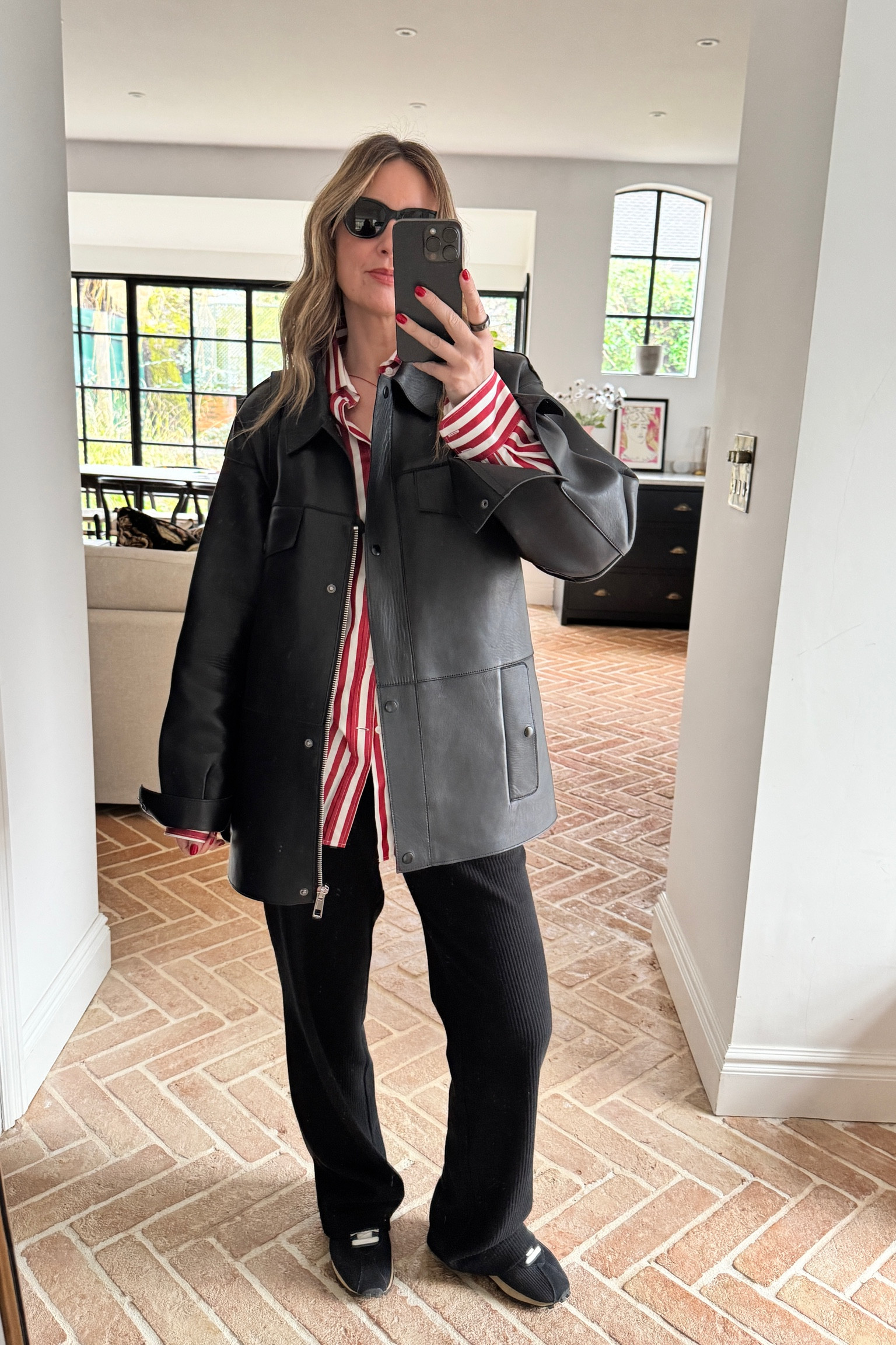 Casual Trousers + Striped Shirt + Leather Jacket + Nikes 

#LTKeurope #LTKworkwear #LTKstyletip