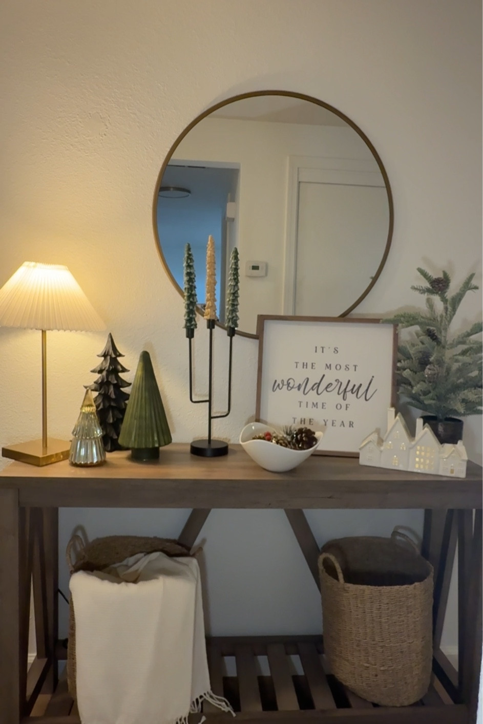 Christmas entryway table decor 

3 trees, candle stick holders and sign is from home goods; linked a few similar options 

#LTKStyleTip #LTKHoliday #LTKHome
