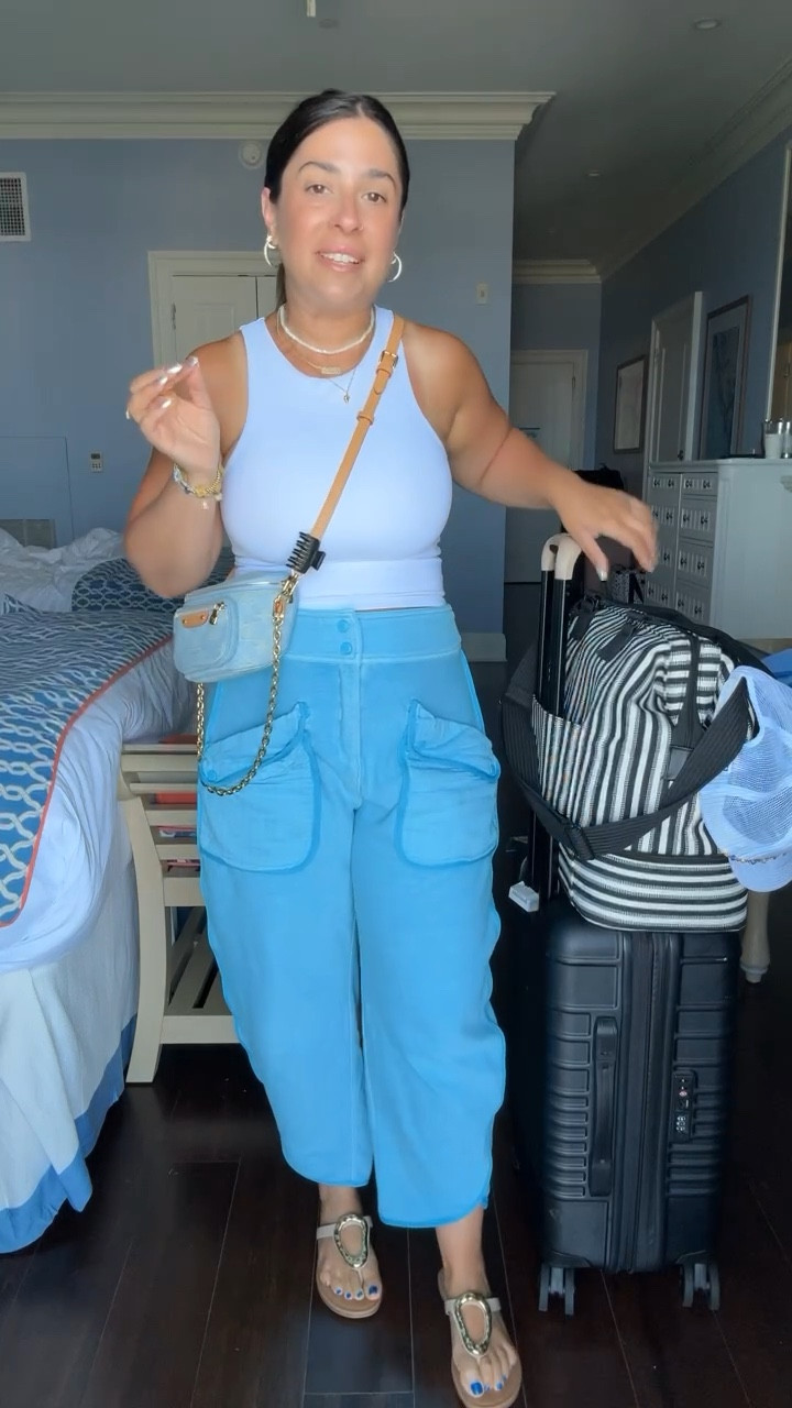 Comfy travel outfit 🩵 Free People flattering blue barrel leg terry cloth sweat pants (own in 2 colors), viral Amazon tank, and belt bag.

Small in bottoms
Xsmall in tank (no bra needed on a 34ddd)

#LTKSeasonal #LTKFindsUnder50 #LTKTravel