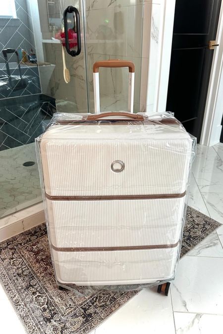 Got this clear luggage protector so I don’t have to worry about my suitcases getting scuffed and dirty in the back of the truck or on a plane! 

#LTKTravel #LTKFindsUnder50 #LTKHome