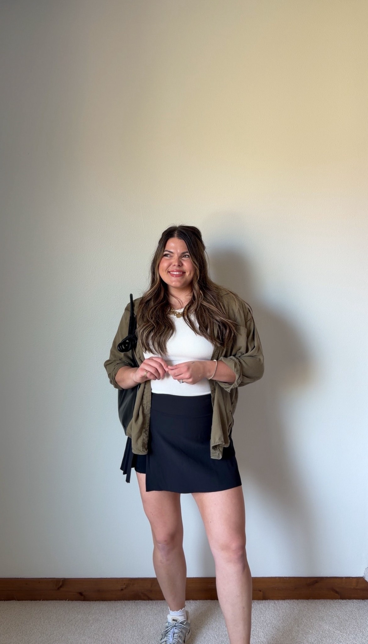 Midsize sports mom / soccer mom spring outfit or summer outfit from Amazon. Wearing size XL in the skirt and tank top , the skort has bike shorts underneath!!

Midsize, size 12, size 14, mom style 