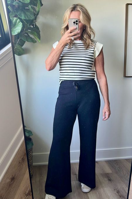 The cutest and comfortable travel outfit for women over 50, summer outfit idea for women over 50,  business casual, fashion over 50, black and white striped top 

#LTKover40 #LTKSeasonal #LTKtravel