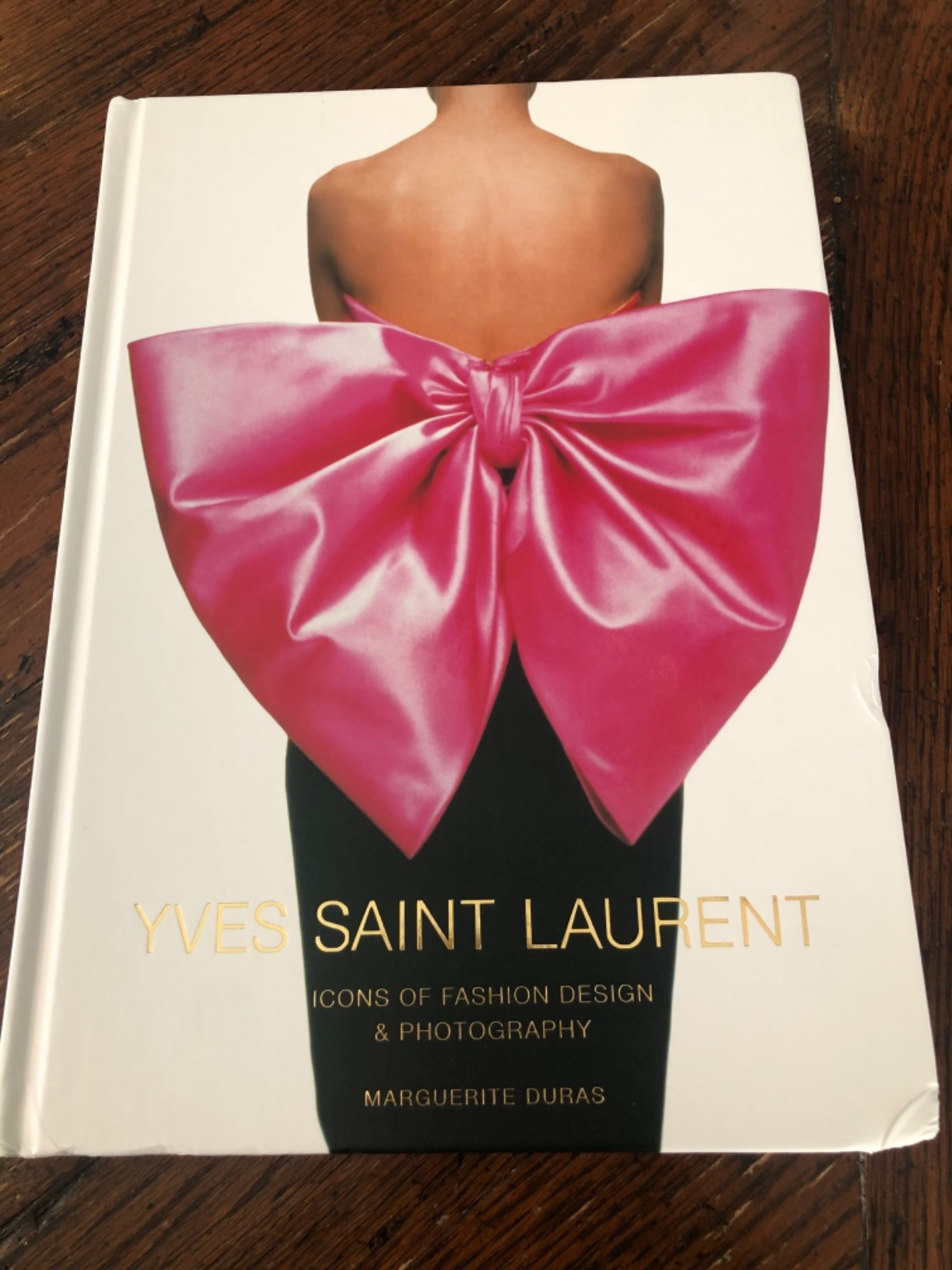 Yves Saint Laurent: Icons of Fashion Design & Photography     Hardcover – Illustrated, March 3,... | Amazon (US)