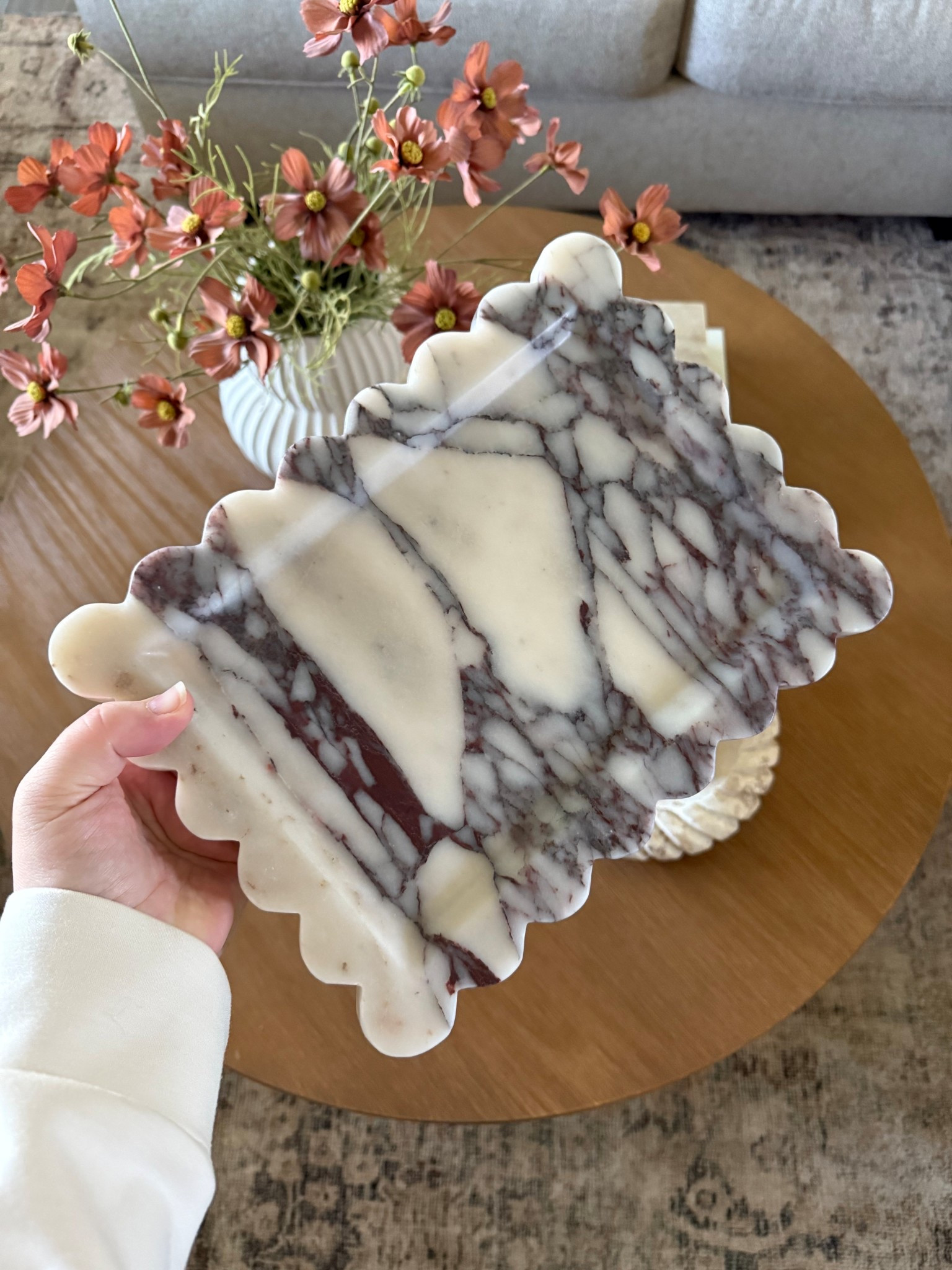 New find from Amazon! I’m obsessed with this scalloped calacatta marble tray 🤍 The burgundy and gray veining is so rich and dramatic, and since it’s real marble every piece is completely unique. One of those small decor finds that instantly makes anything you style on it feel elevated.

#LTKHome