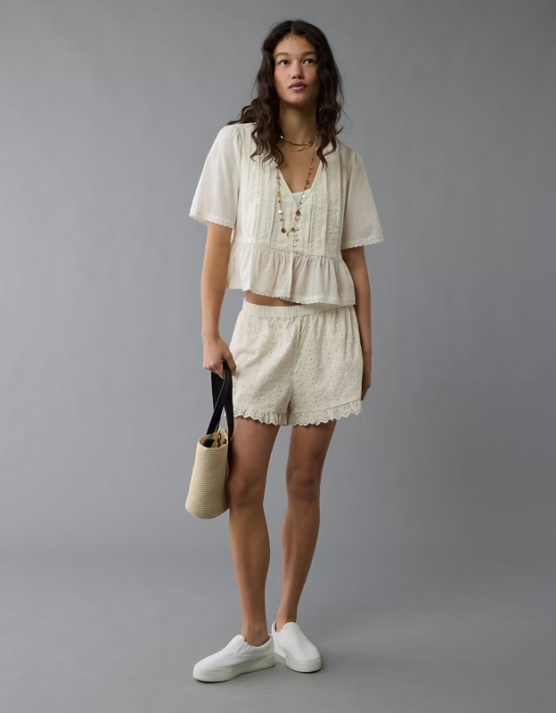 AE High-Waisted Eyelet Ruffle Short | American Eagle Outfitters (US & CA)