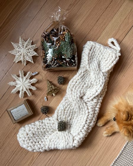 Christmas decor finds from Crate & Barrel | white knit stocking, pine cone ornaments, potpourri, snowflake ornaments, and twinkle lights. 

#LTKHoliday #LTKSeasonal