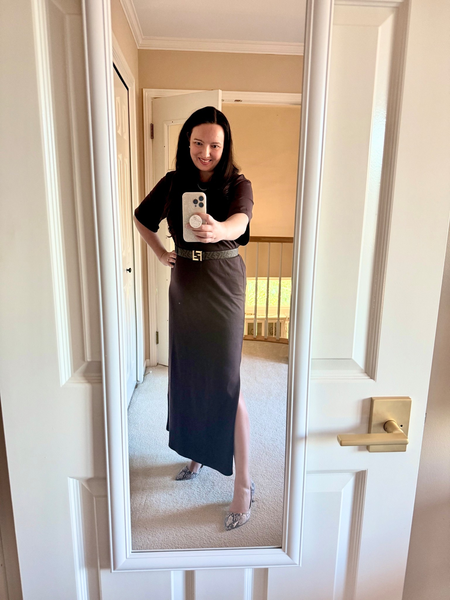 I always love a good midi or maxi length t-shirt dress!  This one is from H&M and is super stretchy and comfortable with a flattering slit and chic longer sleeves.  Added my Fendi belt and some heels to instantly dress it up!  This dark brown color is sold out online but it also comes in solid black, taupe, and a black and white stripe print. Fits true to size /slightly oversized. 

#LTKWorkwear #LTKSeasonal #LTKMidsize