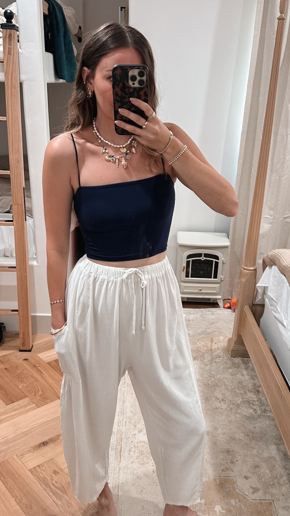 The best linen pants 🤌🏻 wearing size medium barrel pants and tank!

#LTKFindsUnder50