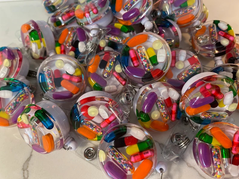 Colorful Chill Pill Badge Reel - Etsy | Etsy (US)