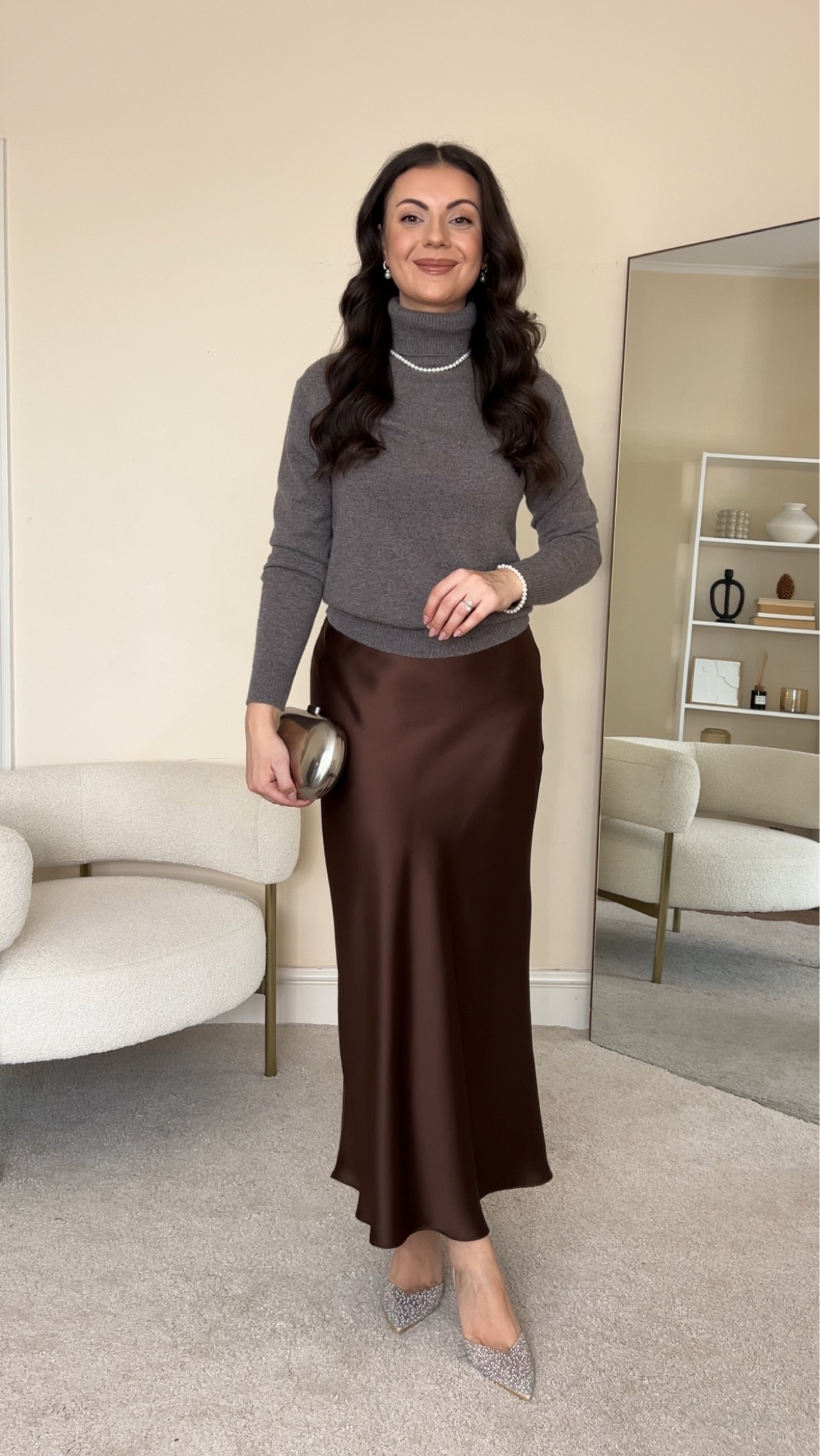Holiday party outfit. Roll neck jumper is M&S, wearing size UK8. Skirt is New Look, wearing size UK10. Pearl jewellery is from Gingiberi, use code Larisa15 for 15% off in addition to the other Black Friday discounts.

#LTKstyletip #LTKpartywear #LTKCyberWeek