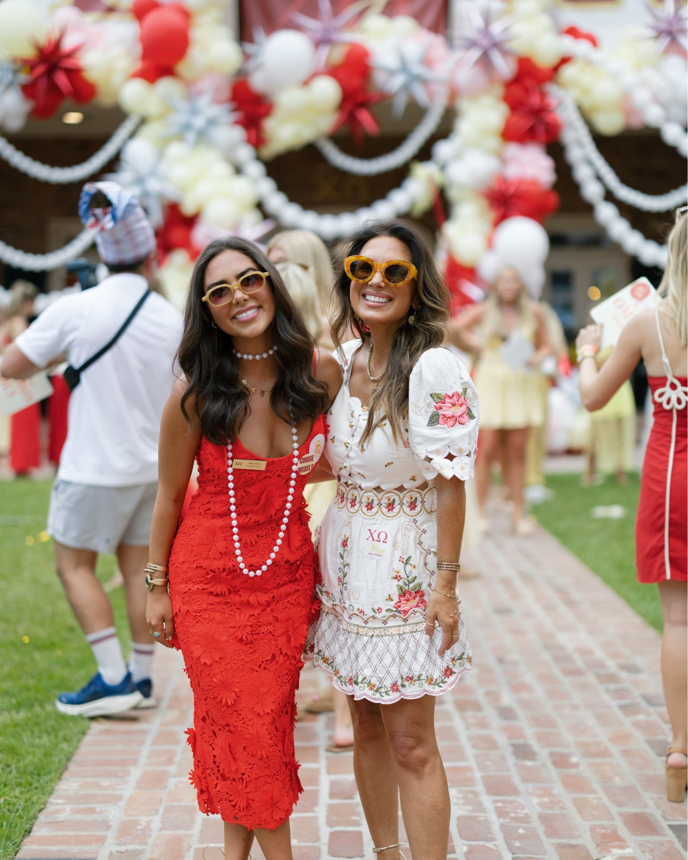 Lots of questions about our dresses from bid day!! Bella’s dress is so beautiful, on major SALE, and runs a little small. She’s wearing a size 4. My dress is from Farm Rio  which is a splurge, and I found it on Amazon. Wearing size small. 
Sunnies and sandals are from Amazon.

#LTKPetite #LTKOver40 #LTKSeasonal