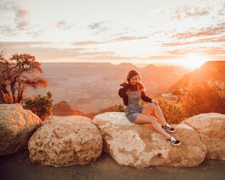 Ashley Butterfield of SideSmile Style wears overalls and a black mock turtleneck with black vans on a trip to the Grand Canyon.

#LTKtravel #LTKSeasonal #LTKunder100