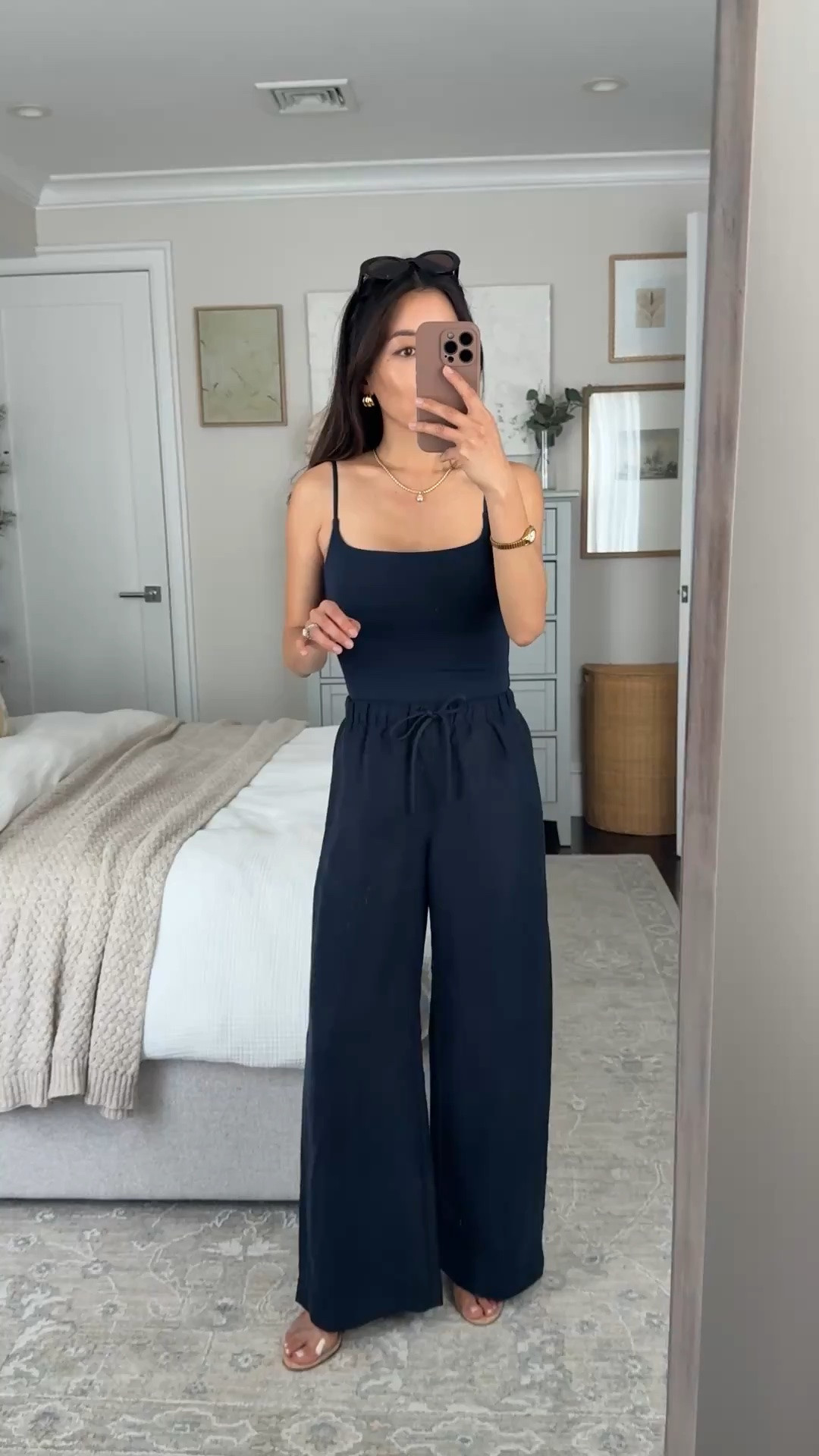 Aritzia sale! A top petite summer pant and sleek cami. 
• Lodge linen blend in 2XS Short
• Cami XS (sized up)
Inseam is about 27.75” on my pants and shrinks a bit if you machine dry. 

Cami is form fitting and comes in 2 length options - regular or a shorter waist-length if you dont want to tuck it in!

summer 2026 outfit ideas, linen pants, petite style, navy look

#LTKPetite #LTKootd #LTKTravel