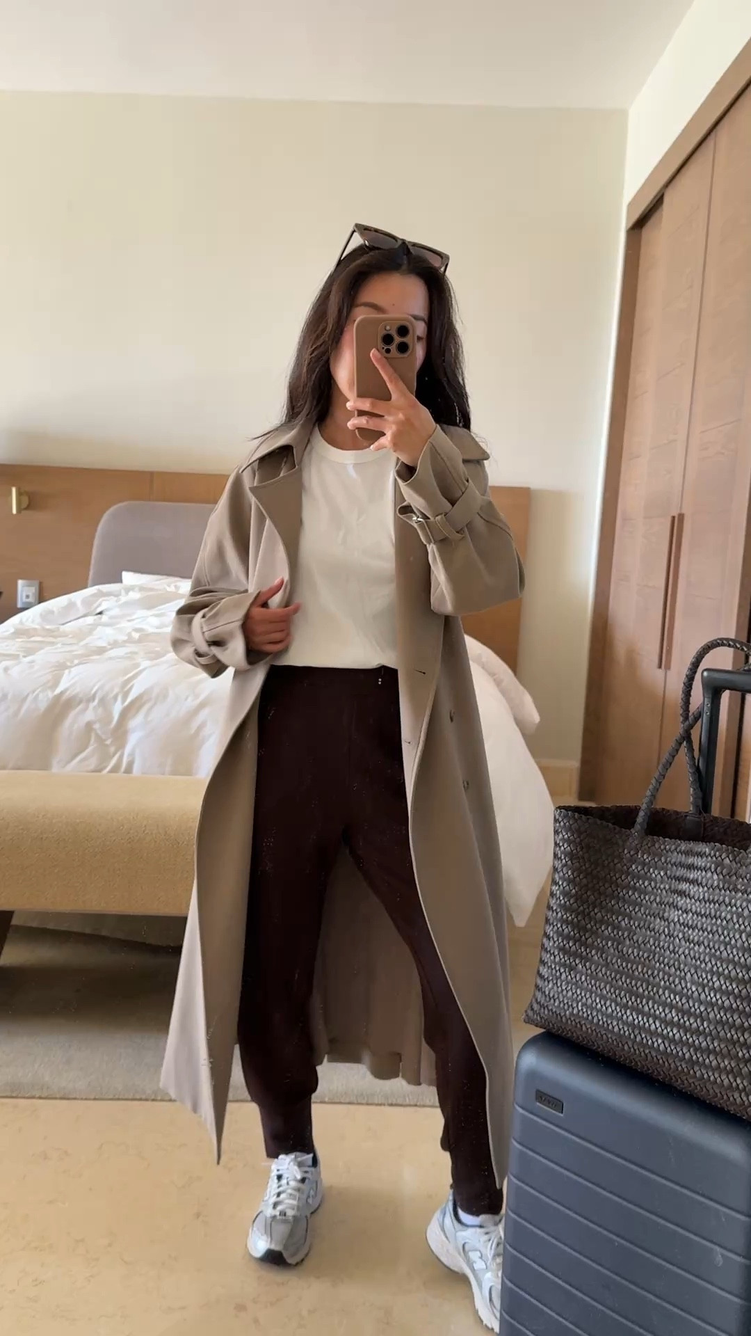 Travel outfit featuring this oversized drape trench coat back in stock!

• Oak and fort trench coat xxs - use code JEANTRENCH for 20% off until 4/20! Color is Brindle, a taupe. Fit is VERY oversized and runs big, but I like the drape and cut and wear this often. 

FYI their online orders policy requires customers to pay for return shipping on returns.

Tip: I tie the belt behind the back snugly into a bow and it helps cinch all the fabric around the midsection 

• Madewell cotton perfect crewneck tee xxs 

• Varley The Slim Pant 25" in coffee bean xxs. The inseam is very petite friendly on me. 

These are so super soft and comfortable, I own them in several colors!

• New Balance 530s - I have the kids version size 3.5 here. can also fit women’s 5 

• Madewell woven leather tote - lightweight and pliable, great size for petites with good capacity as a school, mom, work or travel bag. Fits my laptop easily. Can even double as a pool tote.

• Away the larger expandable carry on

Family travel, travel outfits, petite friendly 

#LTKPetite #LTKActive #LTKTravel