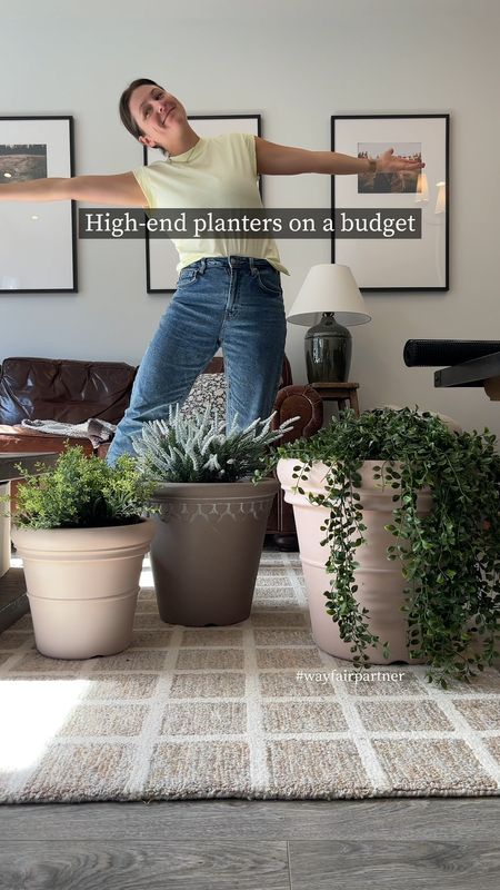 #wayfairpartner I’ve got expensive taste but I’m on a budget (and I also kill plants), so I created some affordable Pinterest-worthy faux spring planters from Wayfair. @wayfair’s BIG Outdoor Sale is happening now until March 25, 2024, so it’s a great time to get ready for spring. 🌱🌸

When I say it took me FOUR hours to find the perfect faux terracotta planters and plants, I’m not exaggerating - but it was worth it! Just look how luxurious they look.  

How I “planted” the plants: For each planter, I put a layer of rocks at the bottom of the planter with a bunch of balled up mesh garden fence on top. Then I “planted” the faux plants and finished with moss or a layer of gardening plastic and then real dirt on top.

#wayfairpartner #wayfair #patio #patiogarden #backyardgarden #backyardinspo #outdoorplanters #planters Backyard design. Spring gardening. Patio decoration ideas. Patio ideas. Backyard ideas. Outdoor inspiration. Backyard inspiration. Transitional home decor. Faux plants. Modern traditional planters. Outdoor rug. Wayfair deals. Wayfair sale finds. Faux foliage. 

#LTKSeasonal #LTKhome #LTKsalealert