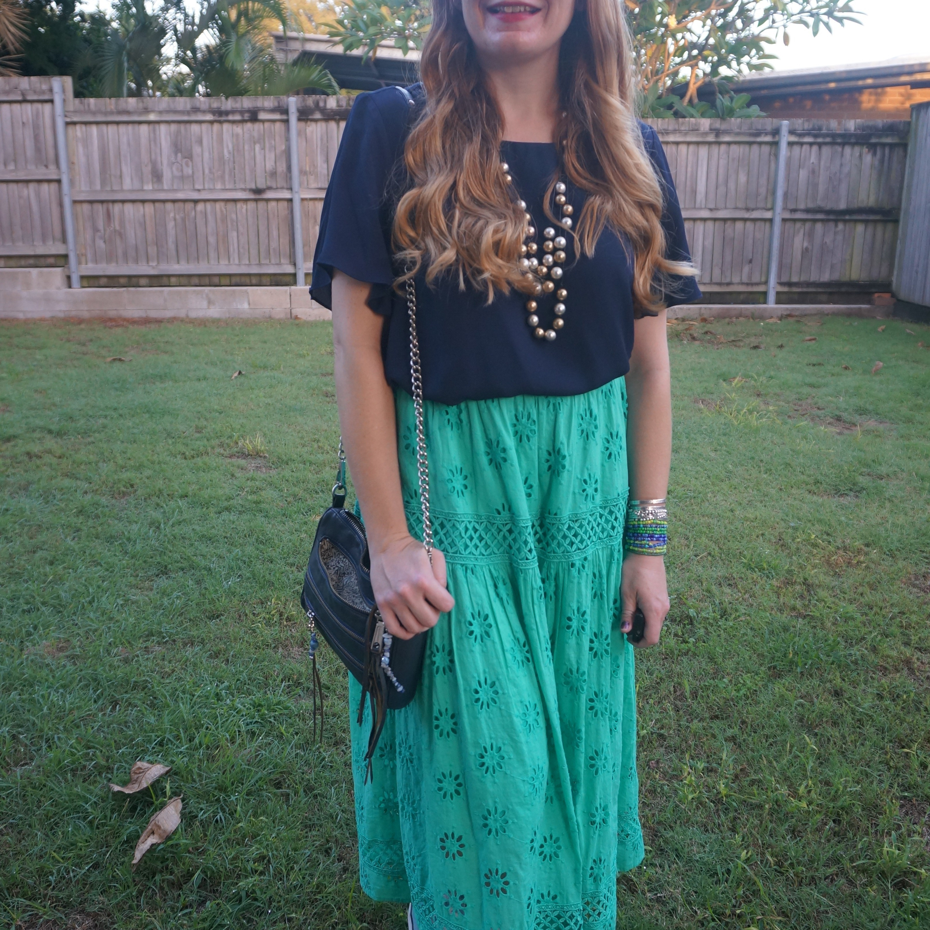Kmart Anko green broderie midi skirt with navy blouse and navy Rebecca Minkoff mini 5-zip bag 💙💚

#LTKaustralia #LTKworkwear #LTKbag