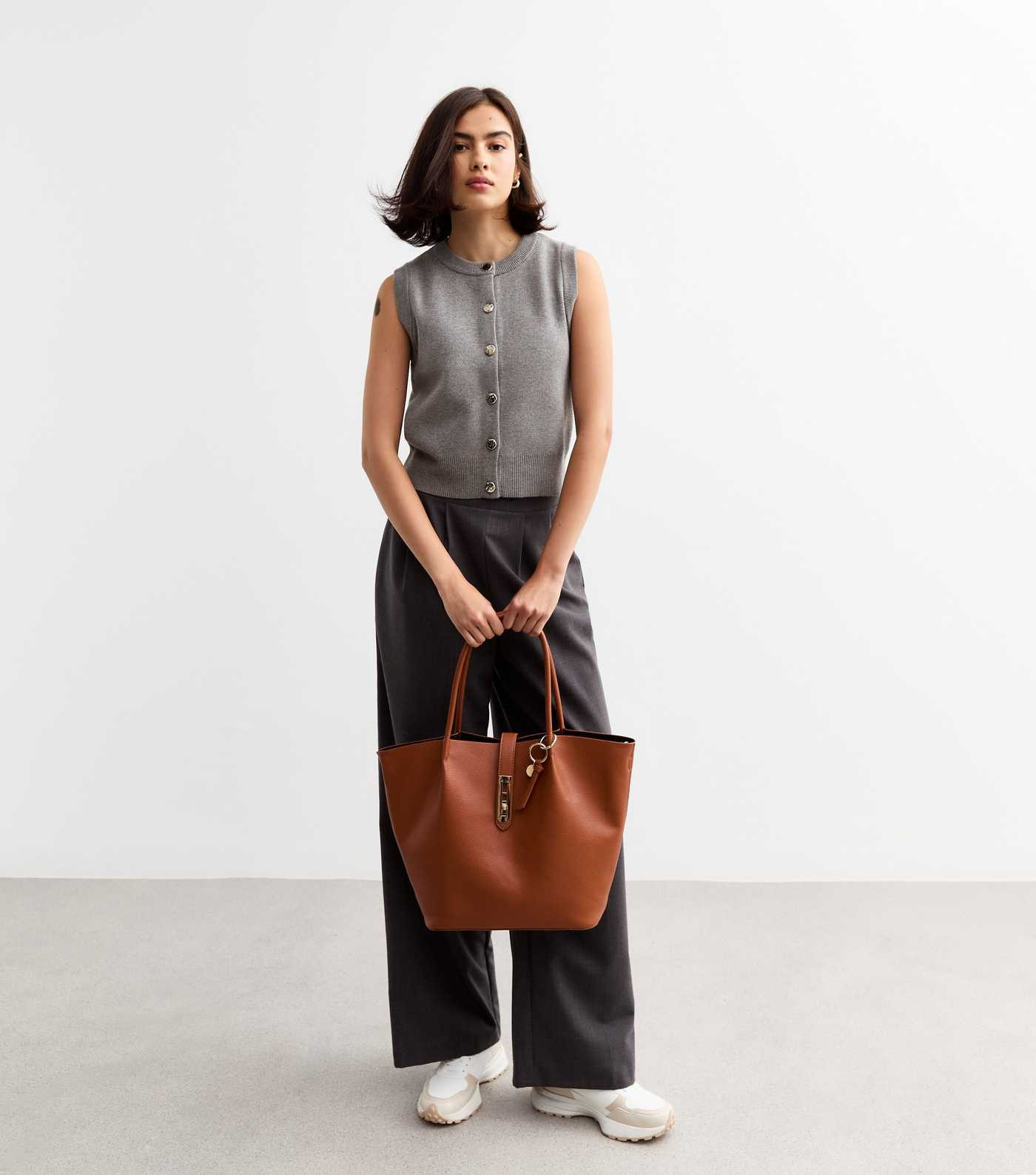 Grey Crew Neck Button Through Knitted Waistcoat
						
						Add to Saved Items
						Remove from... | New Look (UK)