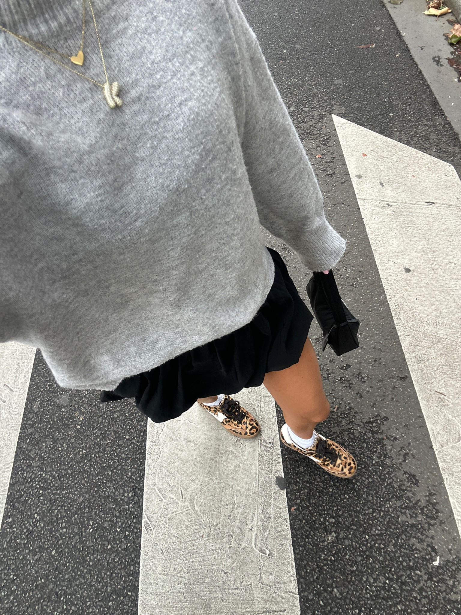 Black bubble skirt with grey sweater 

#LTKstyletip #LTKeurope #LTKtravel