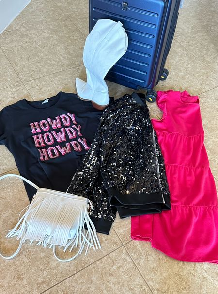 Country western outfit idea. Tried several cowboy boots and these were the most comfortable. Do not get the pink version of this sequin jacket. This jacket is lightweight but lined. Great outfit for a country music concert too. I wore these travel outfits in Nashville. #traveloutfit #vacationoutfit 

#LTKshoecrush #LTKtravel