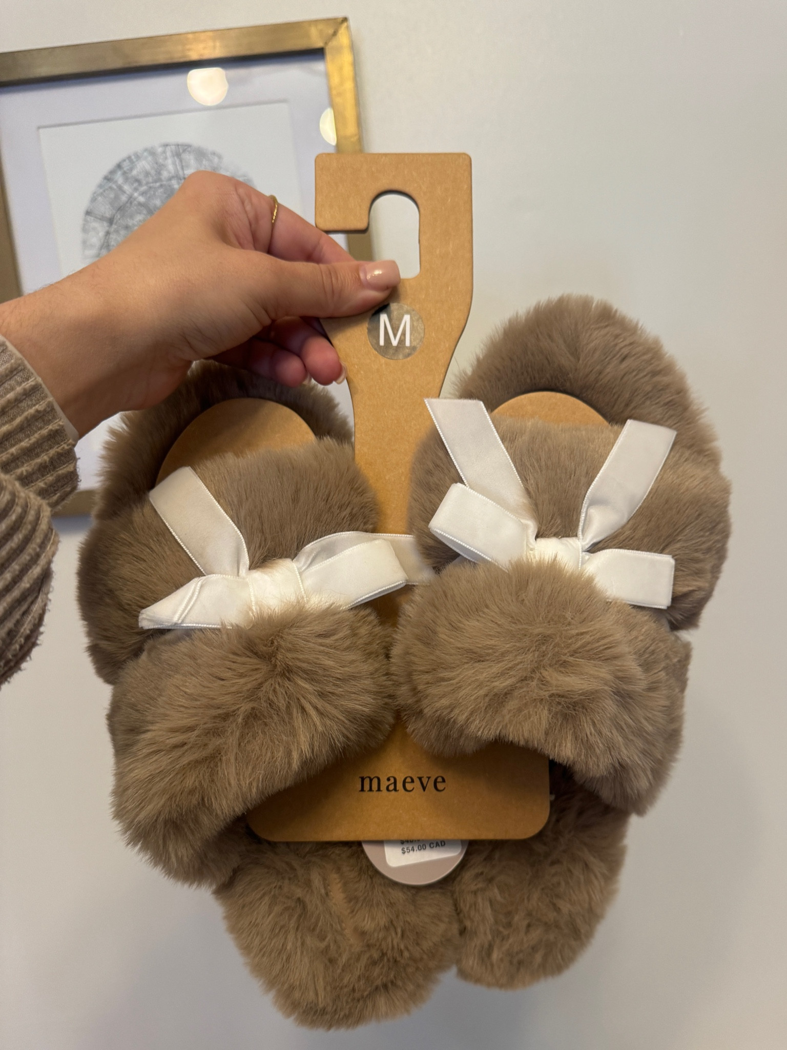 Omg these cute bow slippers are everything!!! 🎀 comes in multiple prints and colors! I tried both the S and M and was in between sizes so sized up. I’m typically a 7.5 but chose the 8-9 because the 6-7 was too small. 

#LTKSaleAlert #LTKGiftGuide #LTKFindsUnder50