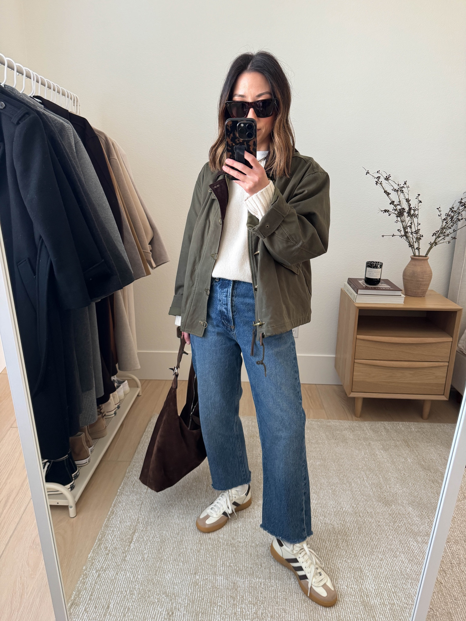 Winter can get a bit depressing when it comes to getting dressed. That's why I put together a winter outfit formula. It saves mental energy, it guarantees polish, it prevents overbuying, and builds consistency. 

Winter outfit formula: 

1. Coat
2. Sweater/Sweatshirt
3. Jeans/Sweats/Lounge/Pants
4. Color Coordinate shoes and bags

Outfit Details

Madewell jacket xs (old)
Nordstrom sweater xs (old)
AGOLDE loose jeans 25, cut hems. Go tts on these. 
Adidas Spezial sneakers 4 mens
Liffner Pillow Hobo bag
Celine sunglasses

#LTKSeasonal #LTKPetite