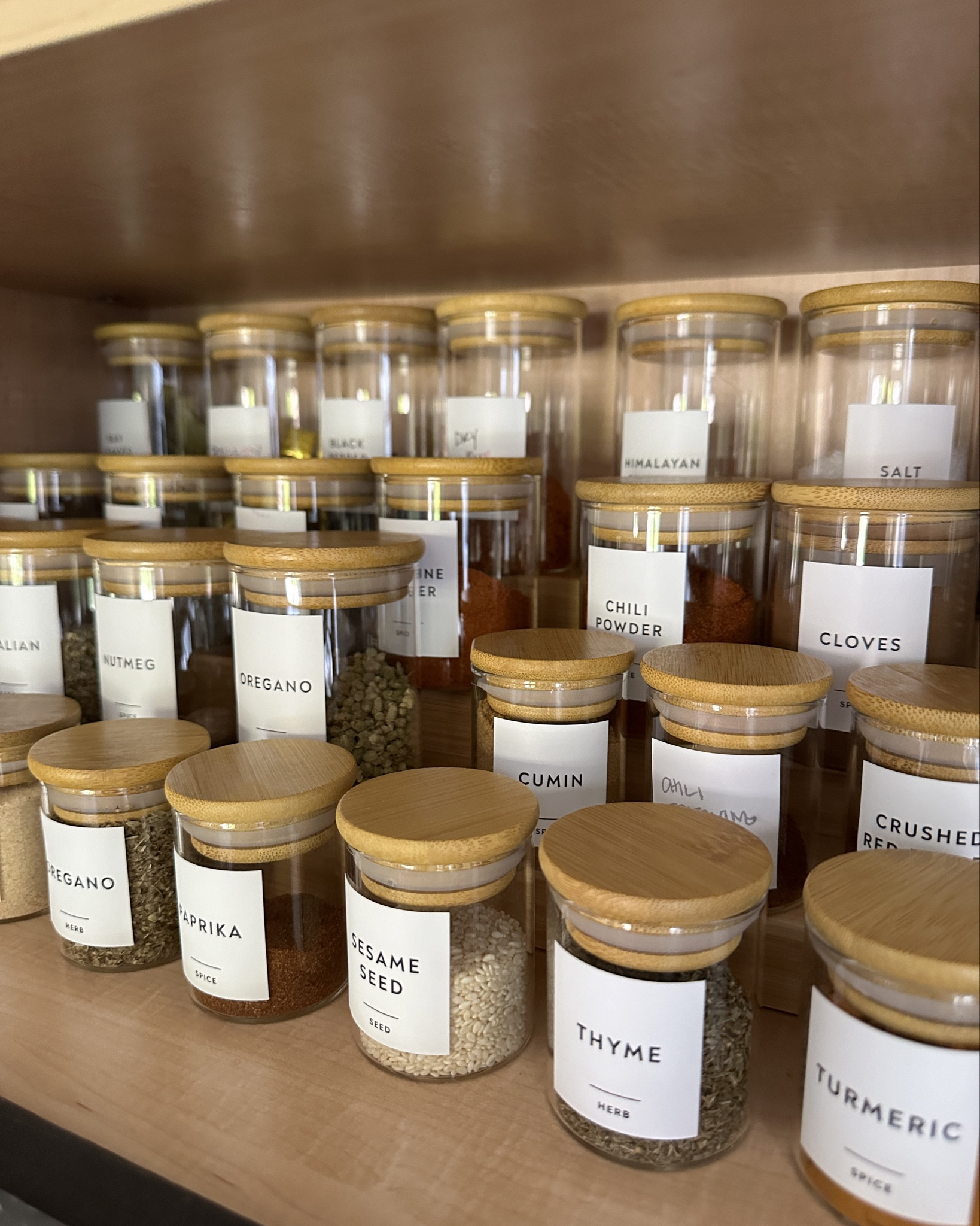 Spice cabinet! 
I ordered one box of each size jar size (2.5 ounce, 4 ounce and 6 ounce) and had some leftover for reference! 
Labels were INCLUDED in the box with the jars  

#LTKHome #LTKVideo