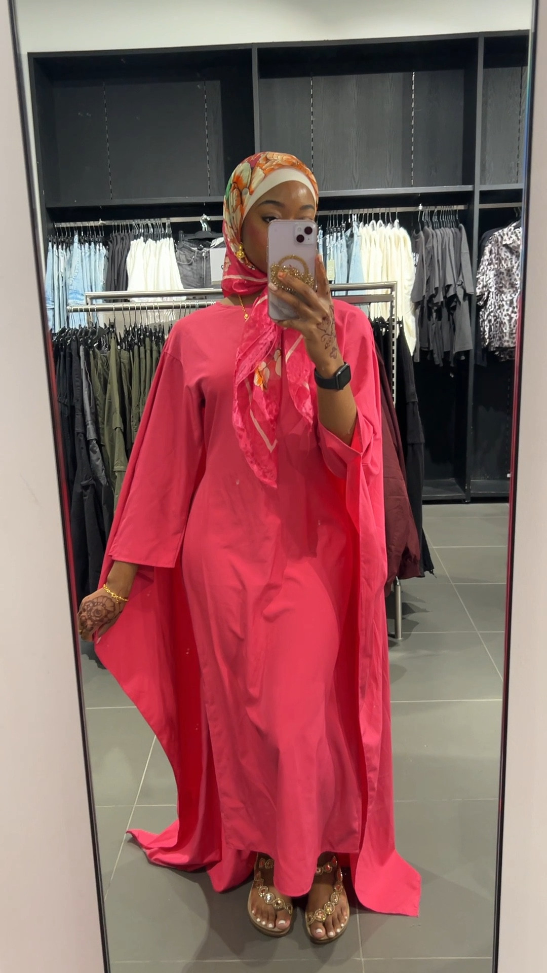 Pink abaya

Printed scarf 

Hijab 