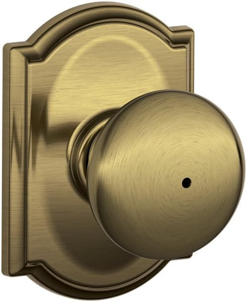 SCHLAGE F40 PLY 609 CAM Camelot Collection Plymouth Privacy Knob, Antique Brass | Amazon (US)