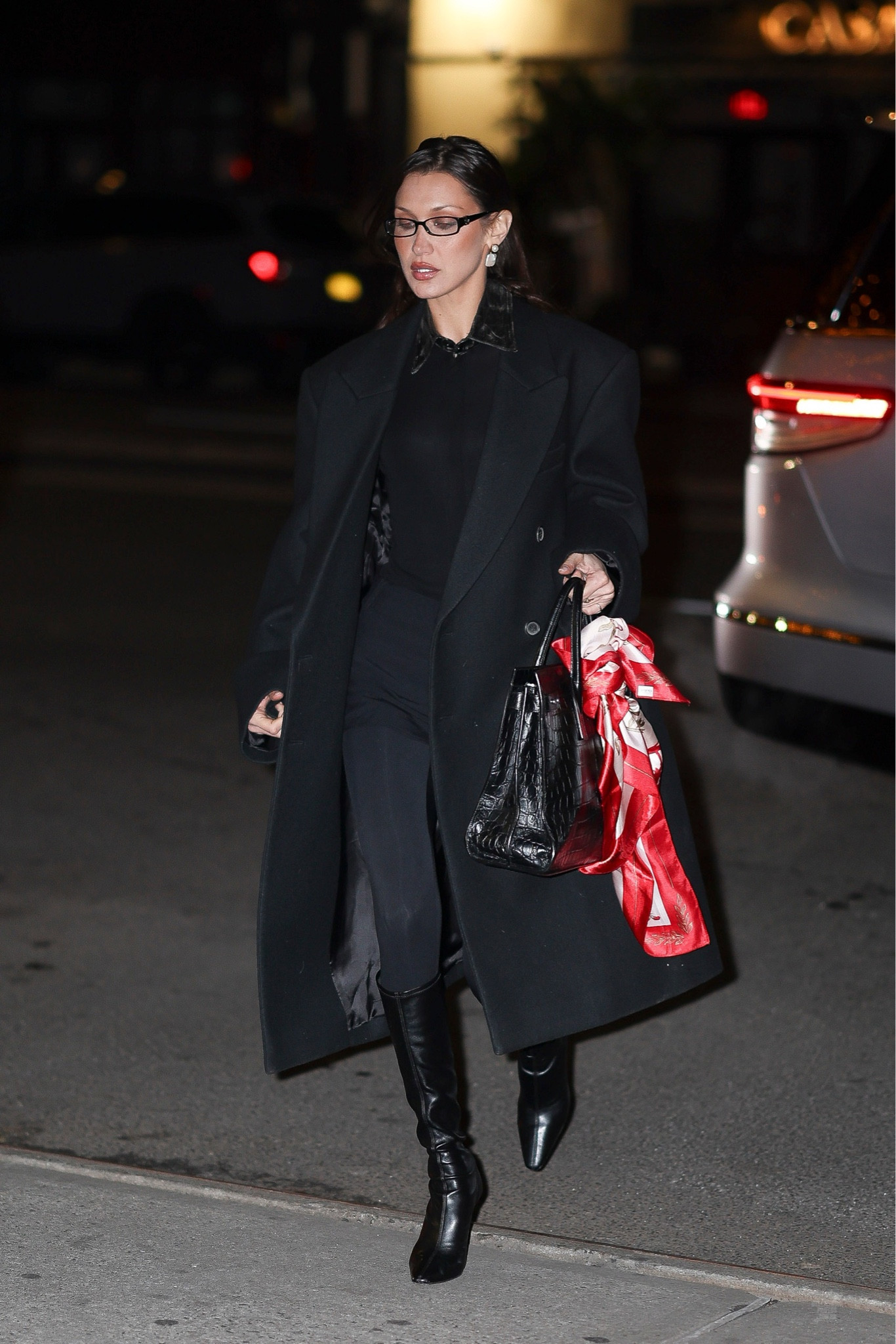 Bella Hadid stepped out in NYC wearing an all-black look, featuring a Saint Laurent coat and bag. She also sported vintage Chanel glasses. #bellahadid #bellahadidstyle #bellahadidfashion #bellahadidoutfits #hadidscloset #gettjelook 

#LTKbag #LTKstyletip