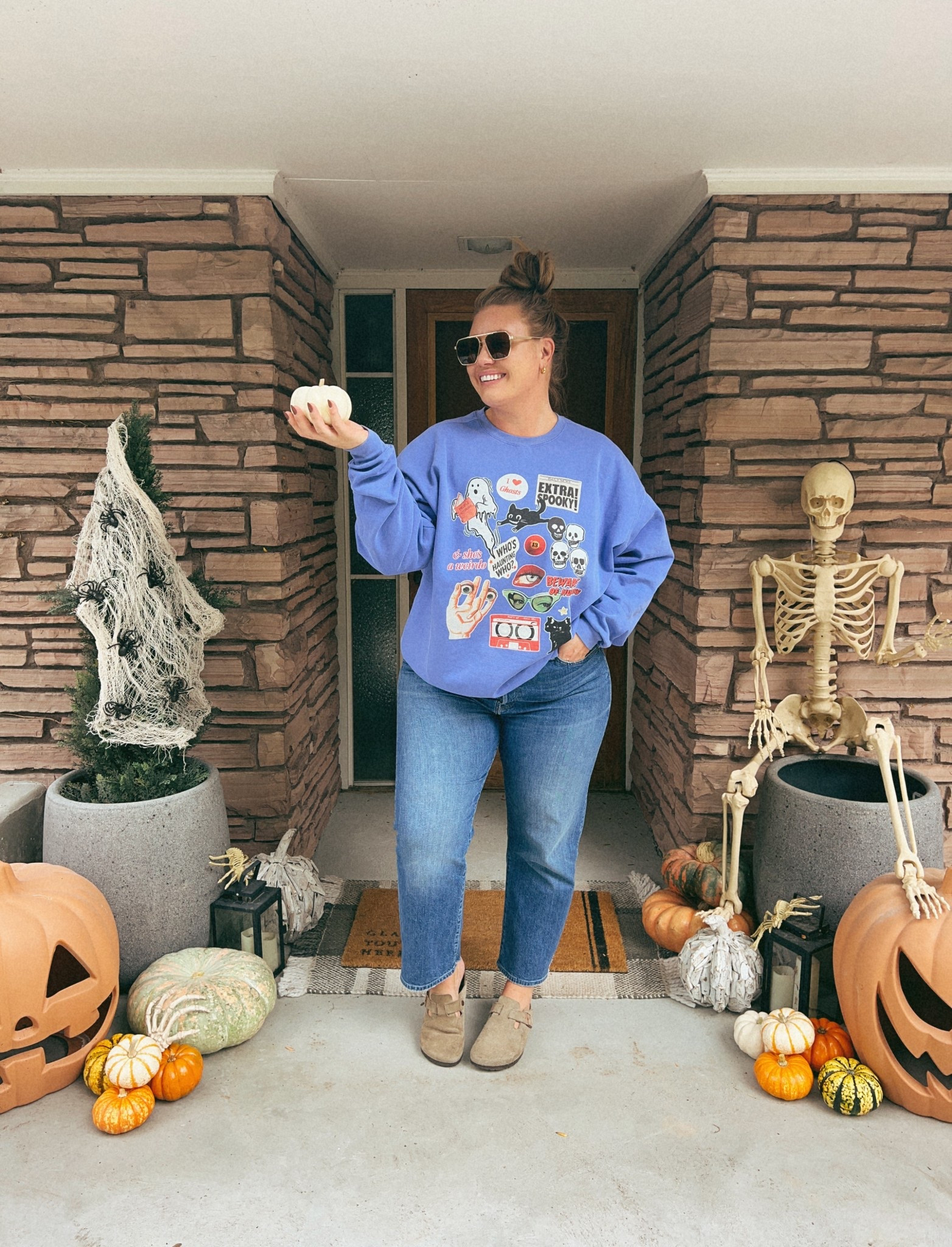 Obsessed with this Halloween sweatshirt! I sized up to a 3xL and it’s so cozy! Jeans run tts, Birkenstocks are a fall staple, tts. 

#LTKHalloween #LTKSeasonal #LTKStyleTip