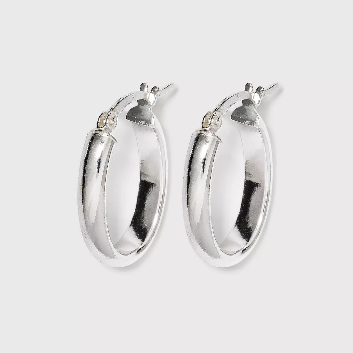 Women's Sterling Silver Hoop Earring Oval - Silver | Target
