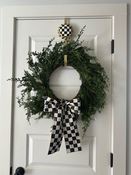 my faux cedar wreath with mackenzie childs bow and door hanger 

#LTKSeasonal #LTKHoliday #LTKhome