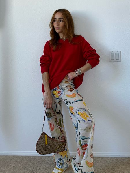 Playful print trousers paired with a bright red sweater is the Fall answer to freshen up your casual look. Pair with bright sneakers for a dopamine dressing outfit.


#LTKshoecrush #LTKstyletip #LTKsalealert