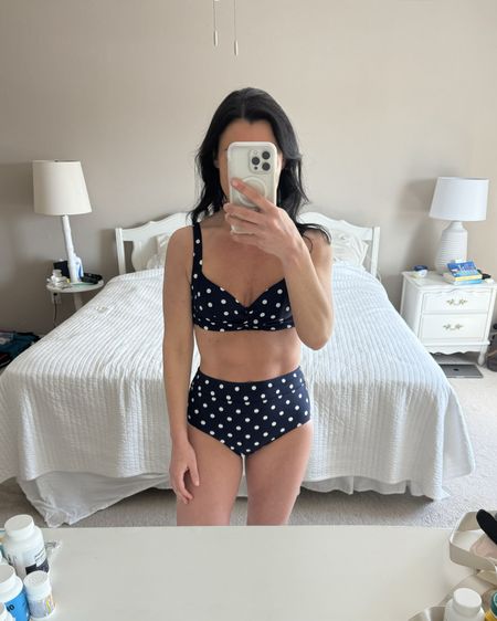 Vacation outfits, Day One☀️ 

I got this classic polka dot bikini swimsuit last year, and I love it so much! It’s under $100. The high-waist is made from a special tummy control material that is super flattering, and I love the classic fit of the bikini top. 

And I just purchased this $30 pink pullover from Target before this trip, and it is INCREDIBLY soft! It’s also a cool to touch fabric, making it great to wear during the spring and summer. 

Sizing:
Bikini fits TTS. I’m wearing a 4 on bottom and 2 on top, but I would probably be more comfortable in a 4 for both parts. 
Pink pullover fits TTS. It is cropped, but loose. I’m wearing an XS.
Shorts fit TTS, wearing a S. 

Casual outfit, casual ootd, vacation, beach, pool, mom outfit, Target style, Target find, vacay look, affordable style 

#LTKfindsunder50 #LTKSeasonal #LTKsalealert