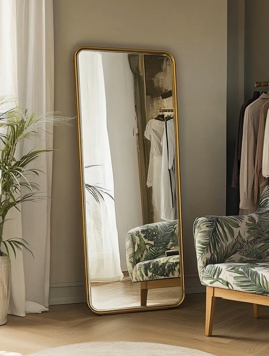 A dressing room is not complete without a full-length mirror.

There is something different about seeing your entire outfit come together at once. The shoes, the silhouette, the proportions, the textures, the way the fabric moves. A vanity mirror can help with details, but a full-length mirror transforms the entire dressing experience.

It turns getting dressed into a moment instead of a rushed routine.

A beautiful gold frame mirror instantly adds elegance to your dressing space while also making the room feel larger, brighter, and more open. It reflects light, enhances your decor, and becomes one of the most functional statement pieces in your home.

And yes, it is also essential for outfit photos, try-ons, and those moments when you want to step back and truly see your style come together.

The beauty of a floor mirror is that it works everywhere.
Next to your wardrobe.
In a walk-in closet.
Beside a lounge chair.
Even in a bedroom corner.

Pair it with soft seating, greenery, or warm lighting, and suddenly your dressing area feels elevated, calm, and intentional.

Because great style deserves a beautiful space to be experienced in.

Explore our edit of elegant full-length mirrors designed to elevate your everyday routine.

#DressingRoom #HomeDecorIdeas #ElegantInteriors 

 #LTKHome