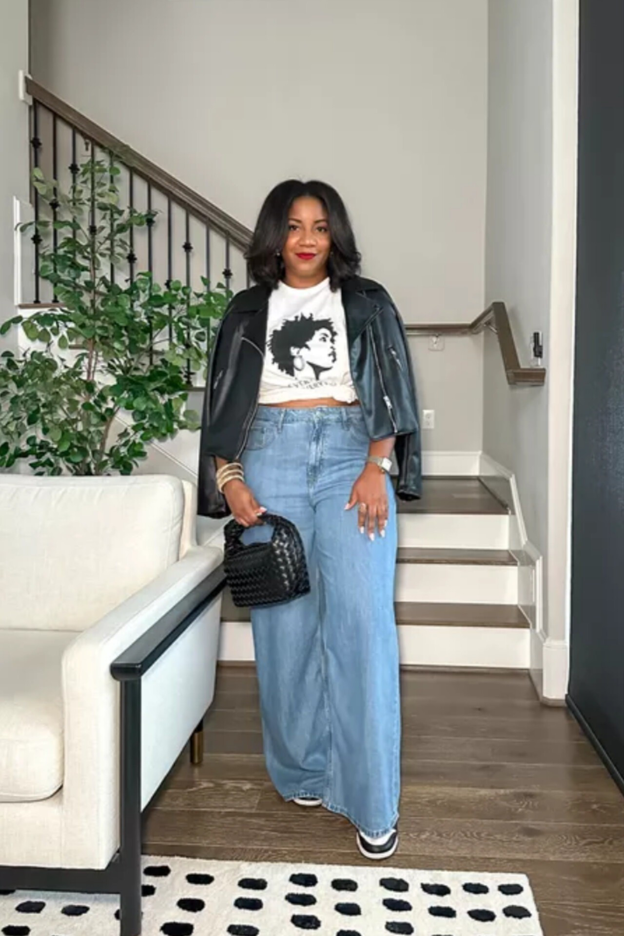 Looking for an easy yet stylish weekend outfit? This effortlessly chic look pairs wide-leg jeans with a graphic tee and a black leather jacketwide leg jeans outfit / leather jacket outfit / black leather jacket style / casual chic outfit / weekend outfit ideas / midsize fashion inspo / casual fall outfit / graphic tee outfit / comfy stylish outfit / fashion for curvy women / everyday street style / black girl style inspo / modern casual outfit / denim and leather look / easy travel outfit

#LTKStyleTip #LTKMidsize #LTKFindsUnder100