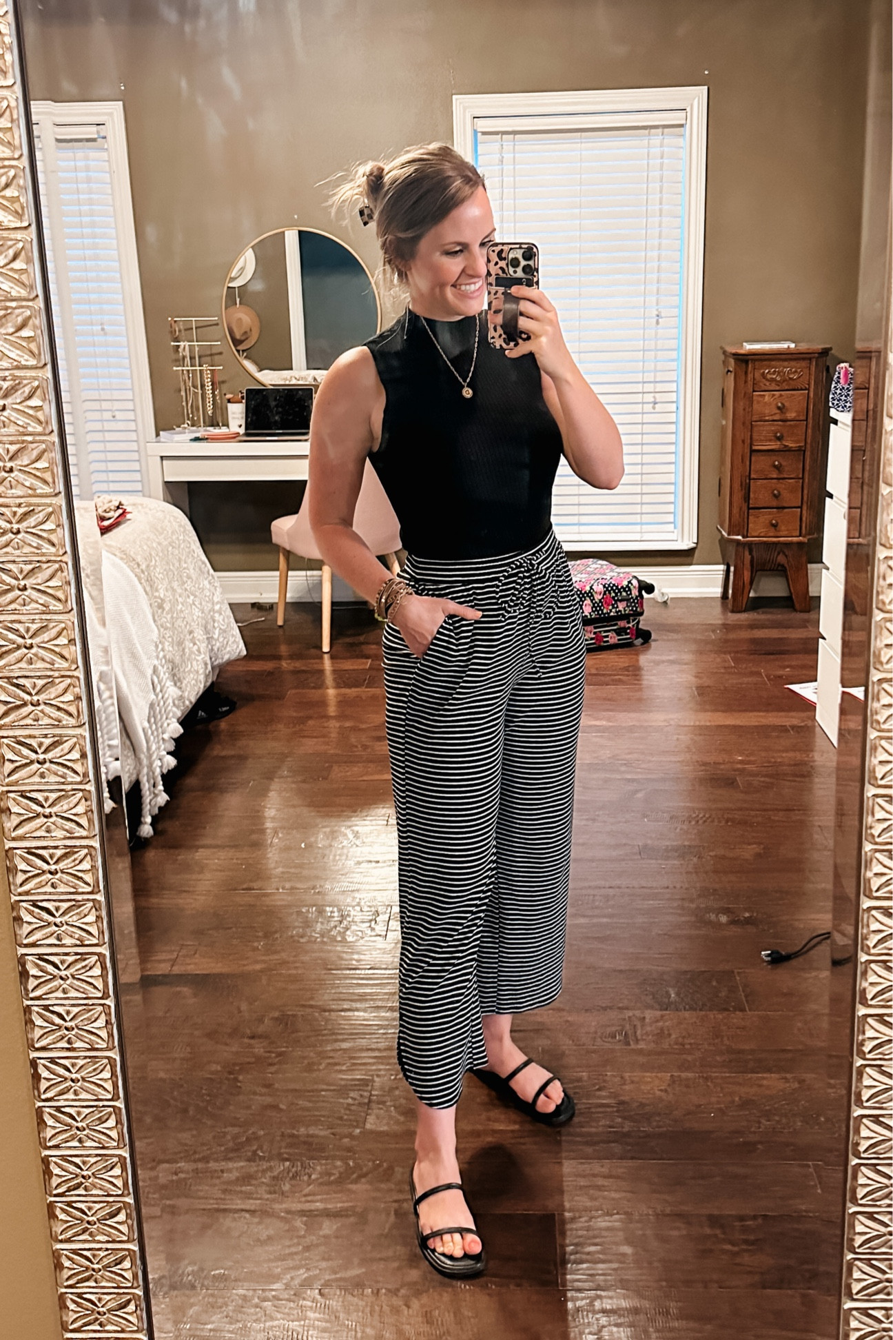 Spring fashion! Amazon top perfect for spring! It’s a sleeveless ribbed mock neck & I love it so much I ordered in white too!  Paired with my comfy high waisted pants! Super affordable outfit. 

Casual style. High waisted pants. Summer outfit. Travel look. Amazon sandals. Summer shoes. Black sandals. Striped jogger. Drawstring pants. Gold initial necklace. Amazon jewelry. Hair clips. 

#LTKSeasonal #LTKunder50 #LTKstyletip