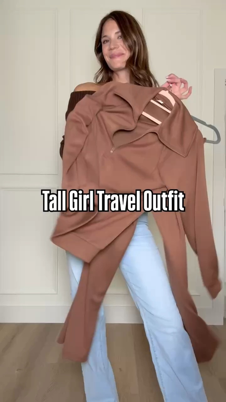 Tall girl travel outfits shouldn’t mean choosing between comfort and pants that are actually long enough! I love a comfy pair of long leg approved pants, a cozy layer, and sneakers for airport days. Comfortable for hours of traveling without looking like you just rolled out of bed.

Tall girl travel outfit, Airport outfit, Tall friendly clothing, Long inseam pants, Travel fashion, Comfortable travel outfit, Tall girl fashion, Airport style, Casual travel outfit, Travel essentials, Athleisure outfit, StangandCo