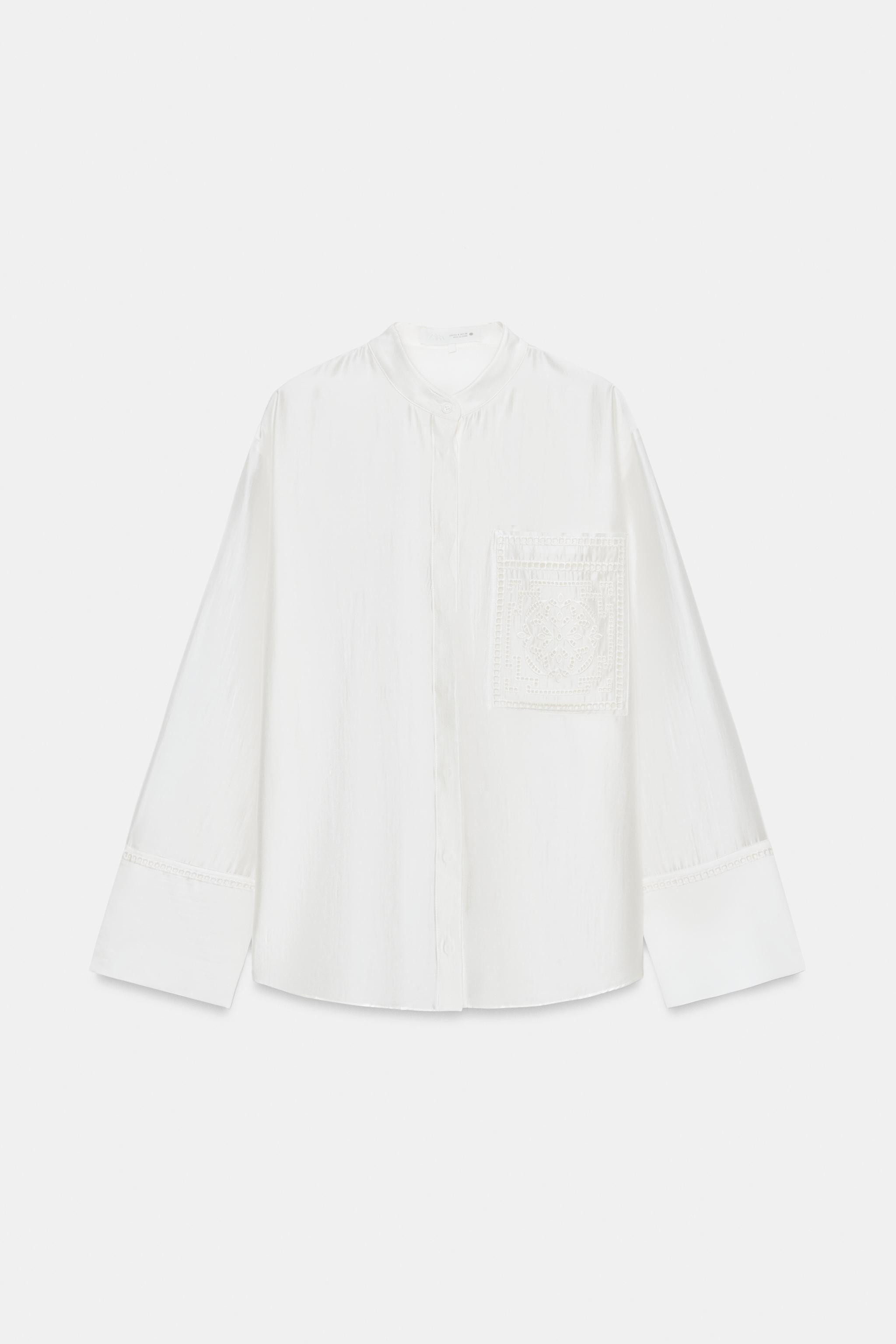 ZARA WOMAN COLLECTIONRound neck long sleeve shirt with cuffs. Patch pocket at chest. Tonal embroi... | Zara US