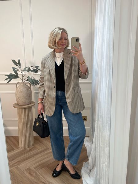 Spring outfit - white t-shirt, knitted waistcoat, blue jeans, check blazer, black ballet pumps 