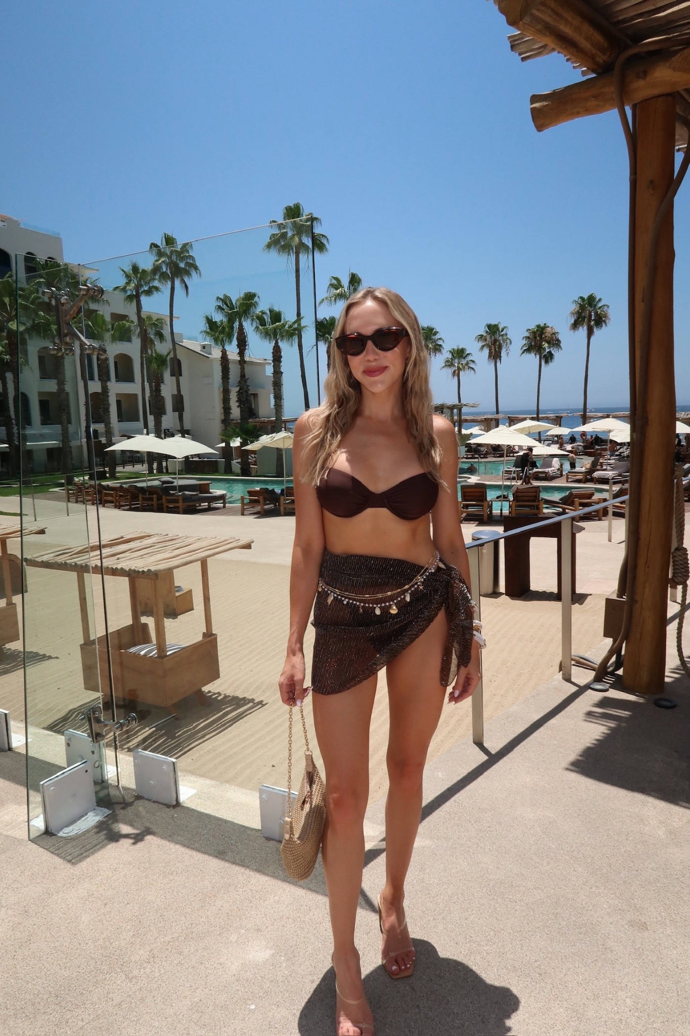 Brown bikini, Cabo beach club outfit idea, clear heeled sandals 

#LTKTravel #LTKFindsUnder50 #LTKFindsUnder100