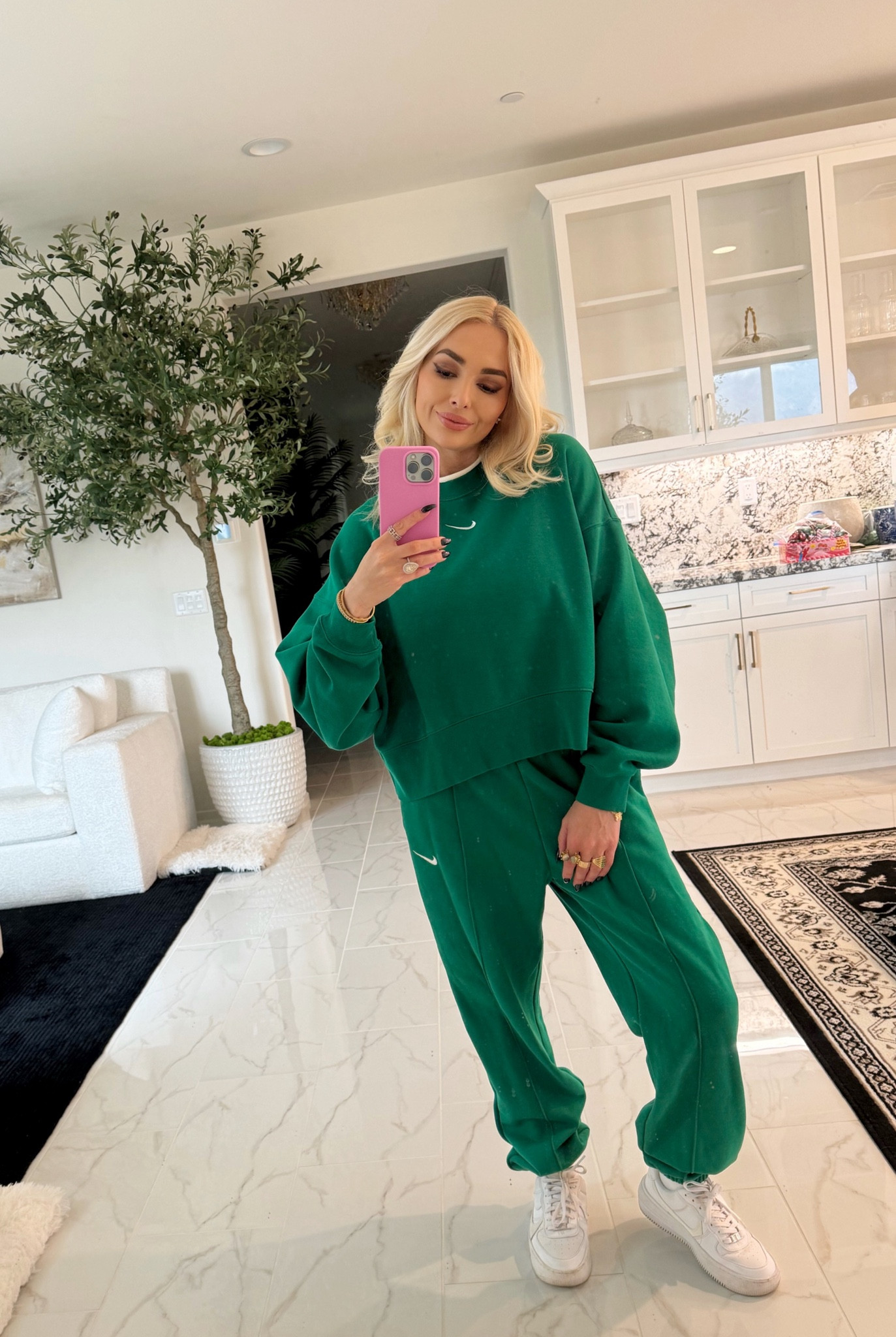 Living in oversized sweat suits these days 💚 Sweatshirt linked and matching sweats can be found online at “rule of next”. Nike- Women’s Essentials Fleece Pants- Malachite. 

#LTKfindsunder100 #LTKSeasonal #LTKfitness