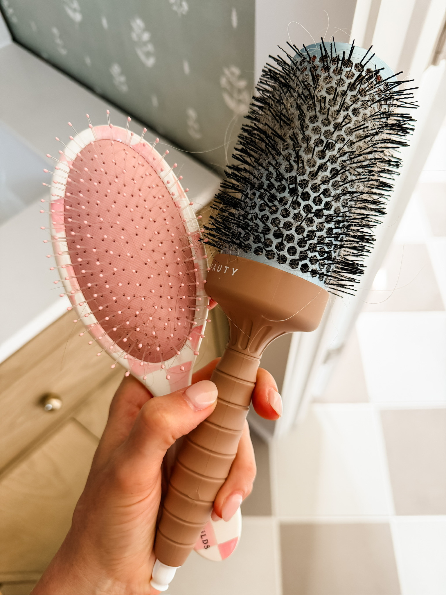 The secret to bombshell hair! I could not live without my wet brush, and this exclusive design with mackenzie childs is so cute! This round brush is also a new favorite for a great blowout- the vented barrel reduces dry time and heat damage!  

Loverly grey, blowout routine products, blow dry favorites, blow dry brush, mackenzie childs target hairbrush, hair products under 40 

 #LTKselfcare #LTKBeauty